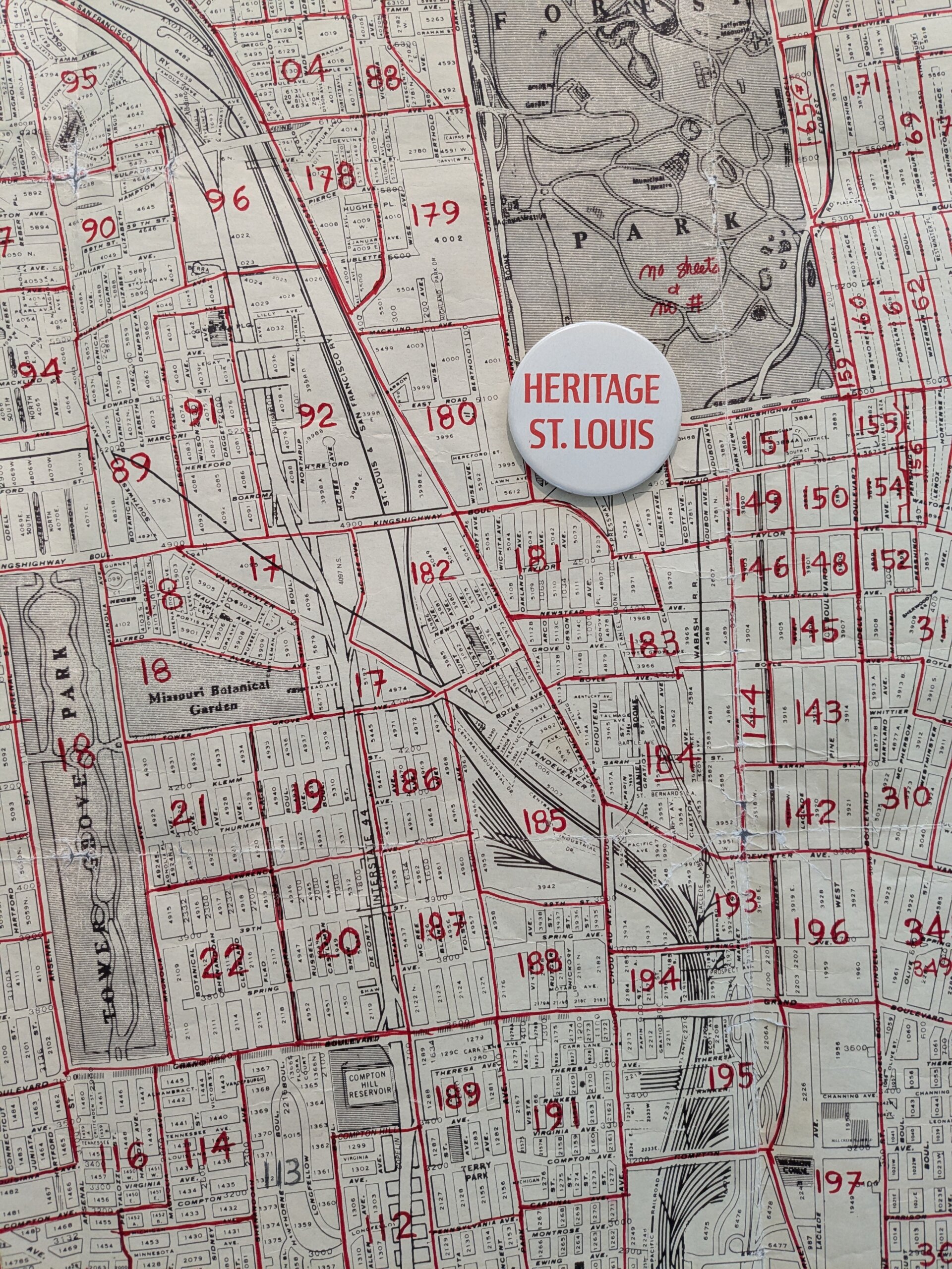 Heritage/St. Louis volunteer pin and a map indexed to the survey files Heritage/St. Louis volunteer pin and a map indexed to the survey files